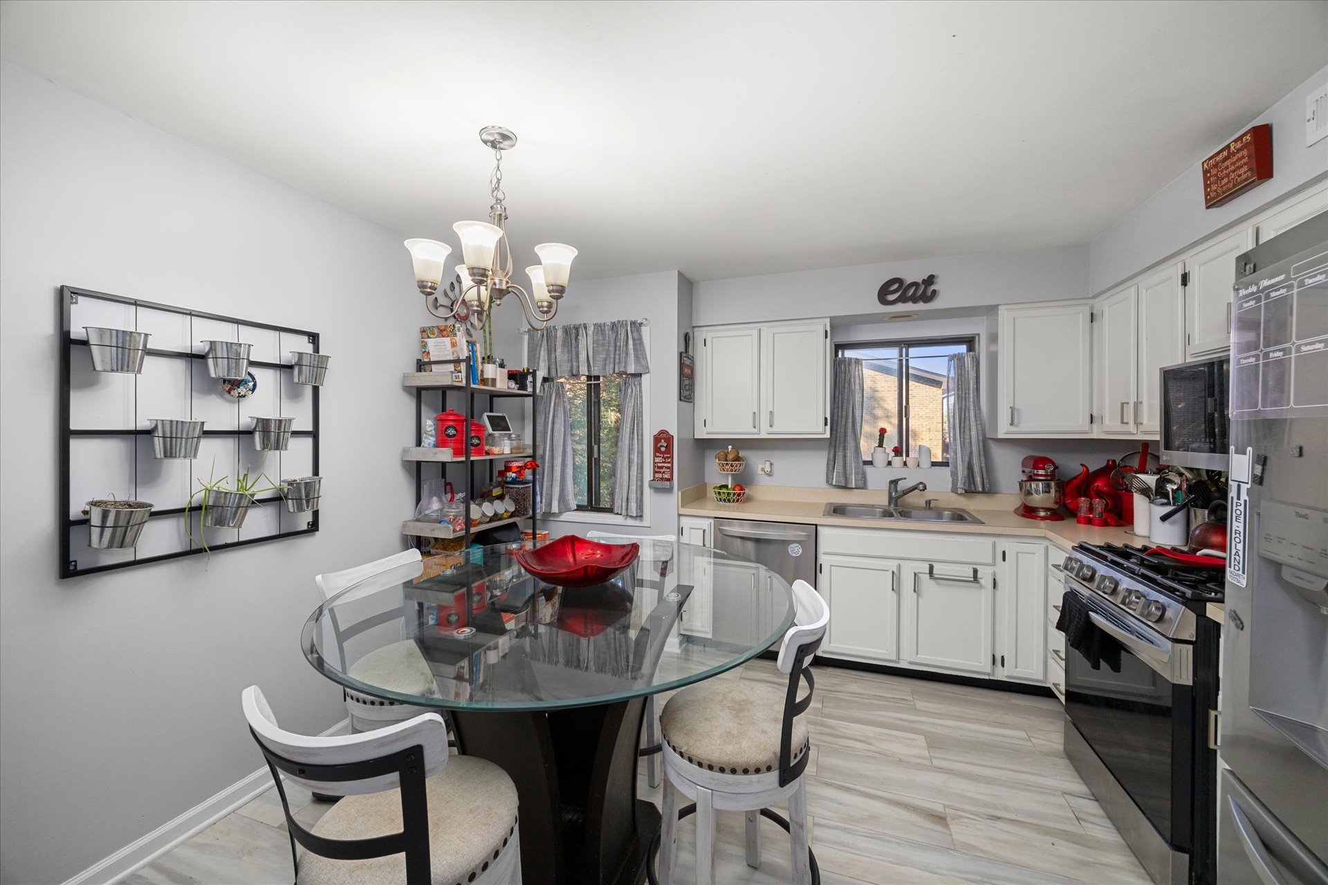 Large eat-in kitchen with 2023 LG stainless appliances and pantry cabinet